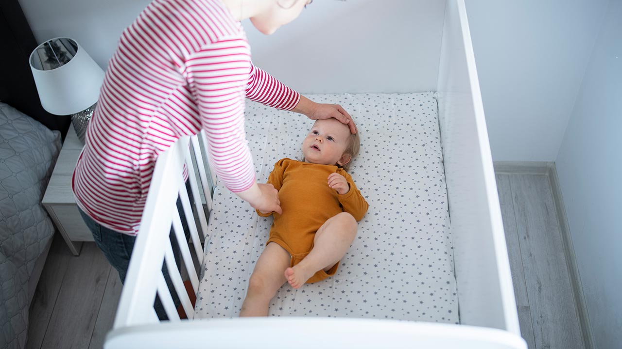 Baby in bedroom with parents best sale