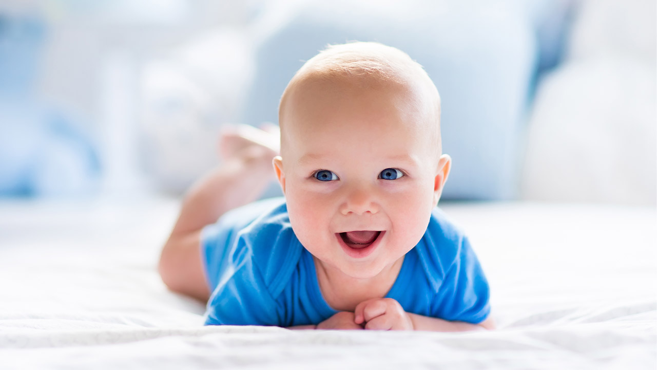 3 week old baby smiling store in sleep