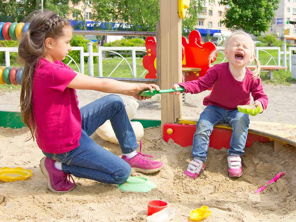 children arguing in playground