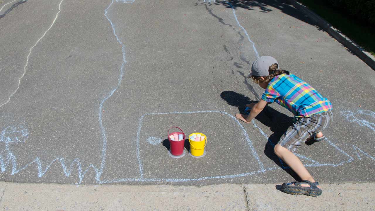 Kids Chalk Drawing On Driveway Stock Photo - Download Image Now